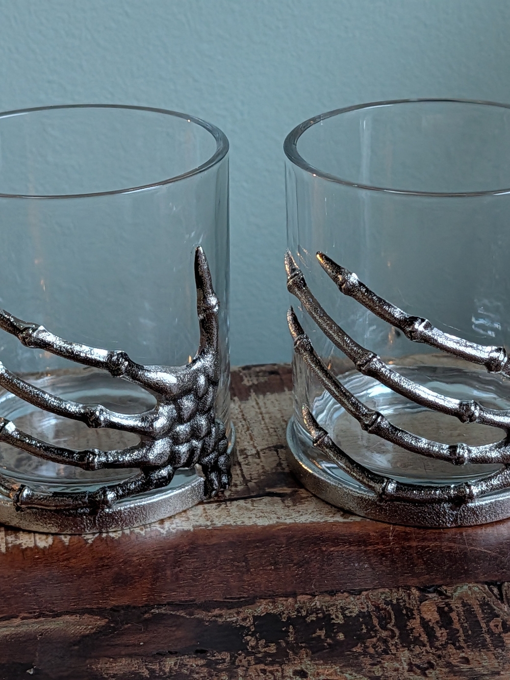 Pottery Barn Set of 2 Glass Tumblers with Silver Skeletal Hand Accent
